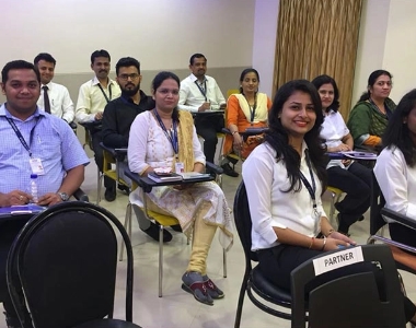 People sitting in conffenrence room