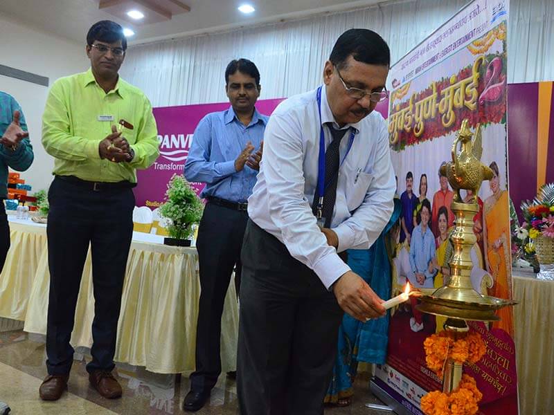 Three mens doing Lamp lighting ceremony