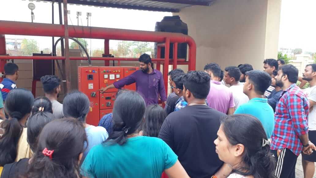 People standing near fire fighting system